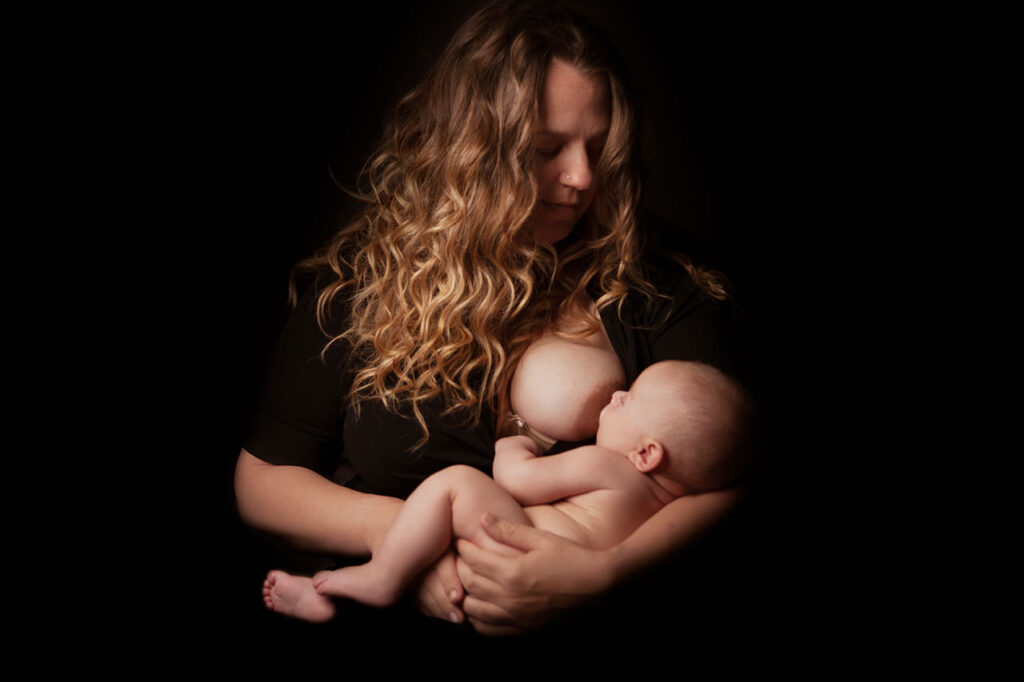 birth photographer, leona darnell, breastfeeding her son