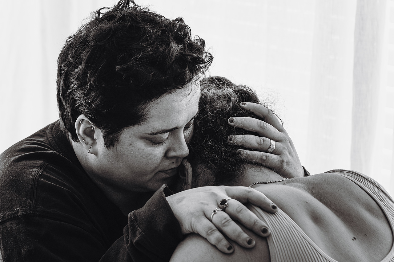 Birth image of a same sex couple during labor at a birth center.