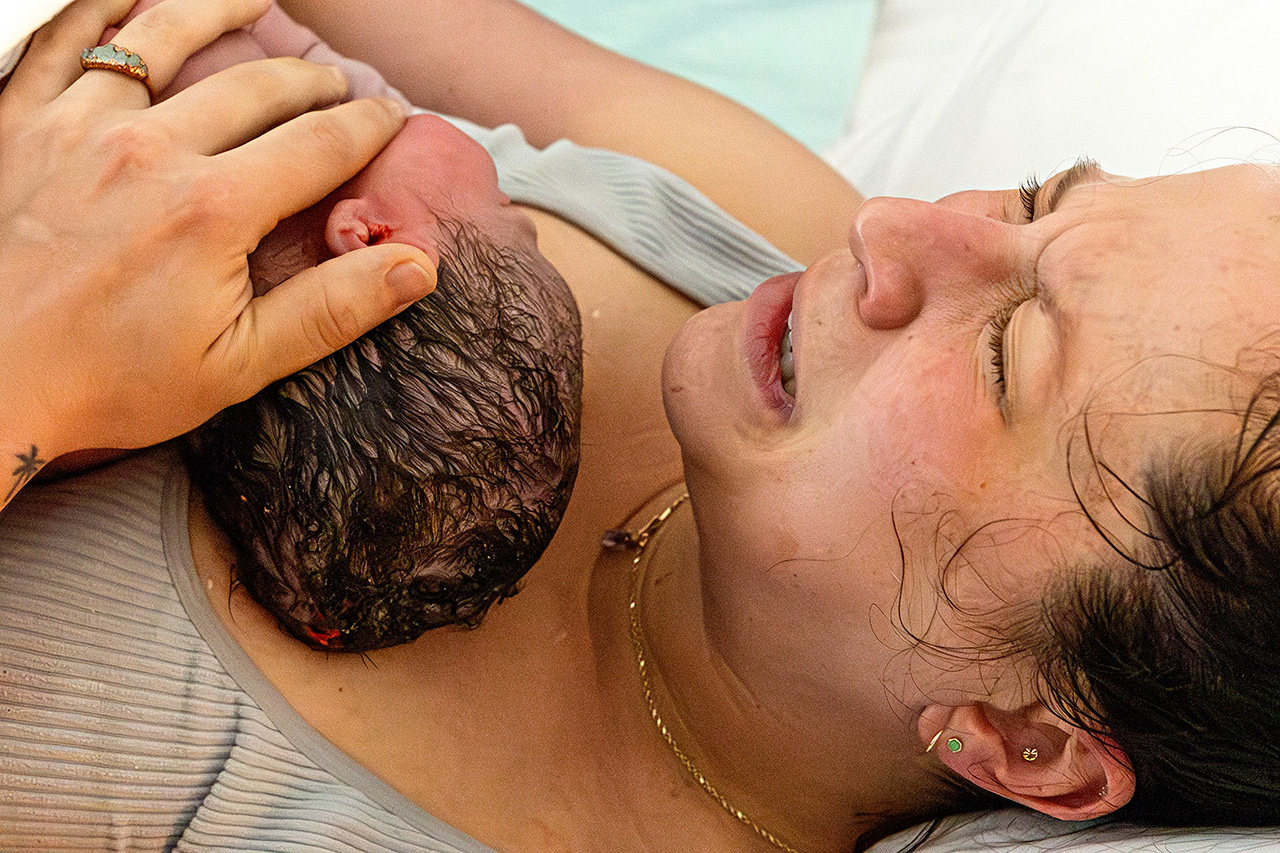 Birth Photo immediately after birth of a mother and her daughter by Leona Darnell.